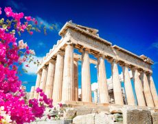 Parthenon,Temple,Over,Bright,Blue,Sky,Background,,Acropolis,Hill,,Athens